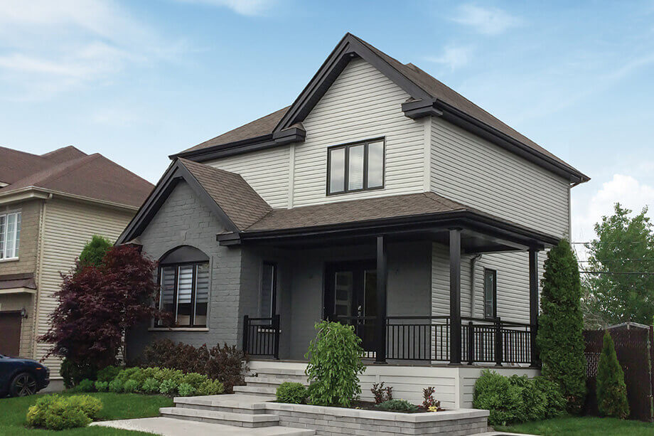 Light and dark gray house with black trim