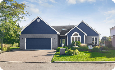 Dark blue and dark gray house with white trim